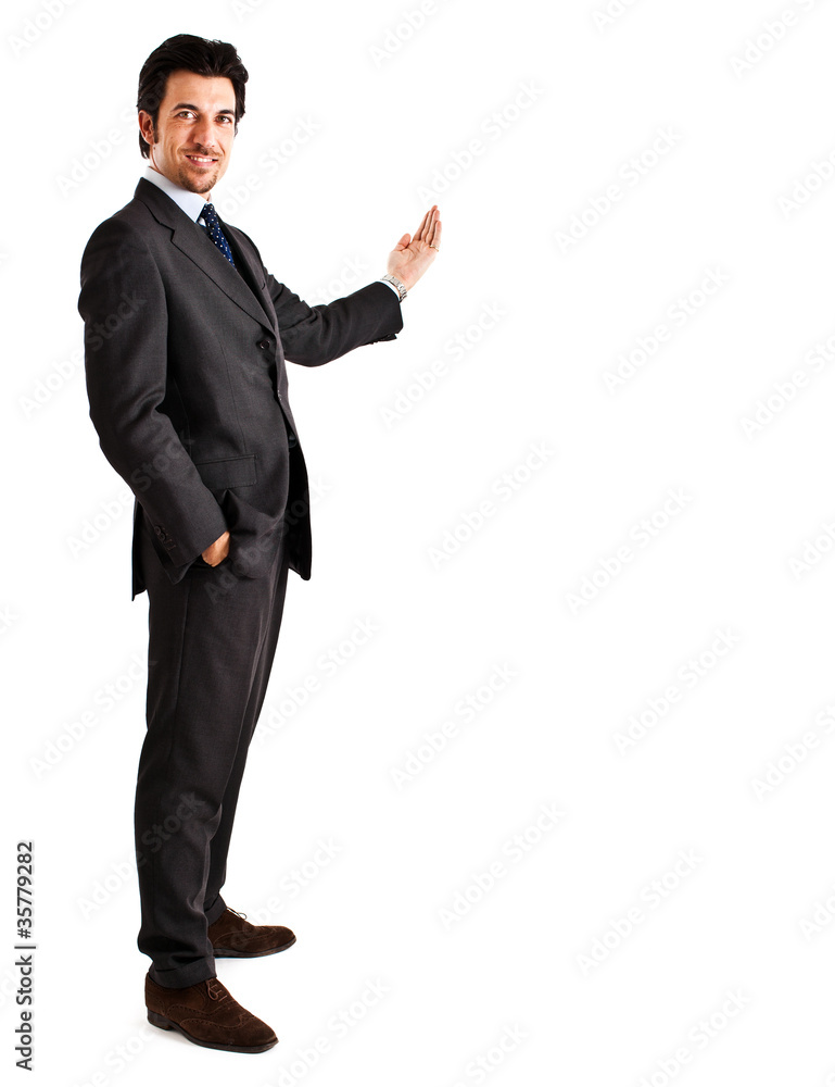 Full length businessman indicating something. Copy space Full length businessman indicating something. Copy space