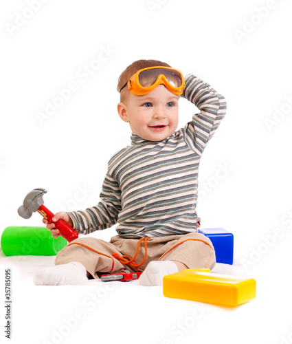 little boy with building bl...
