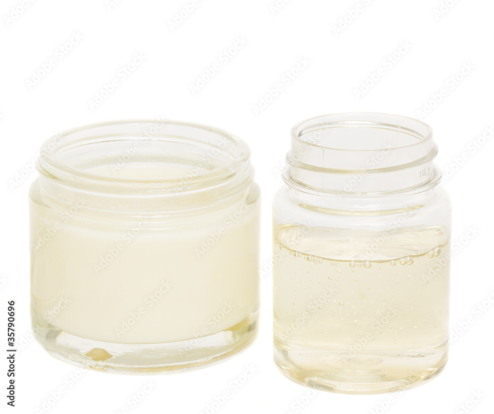 jars with cream and lotion isolated on white background jars with cream and lotion isolated on white background
