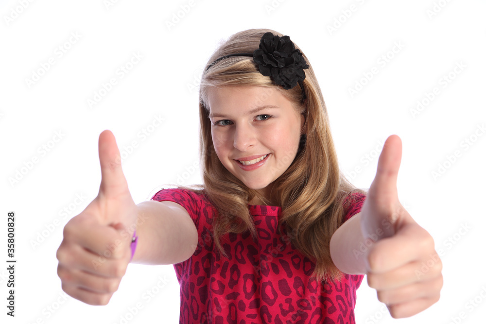 Thumbs up positive hand sign by blonde school girl Thumbs up positive hand sign by blonde school girl