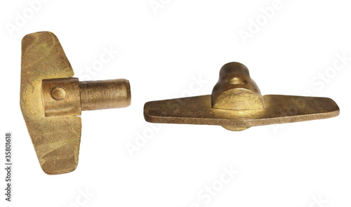 Obraz na plátně old clock key winder isolated on white background, texture
