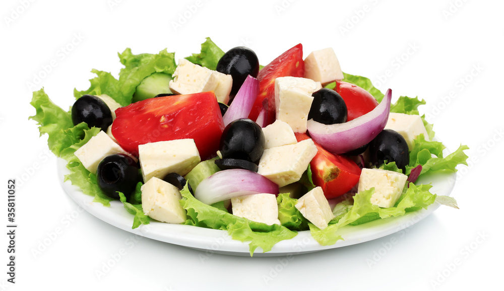 Tasty greek salad on plate isolated on white Tasty greek salad on plate isolated on white