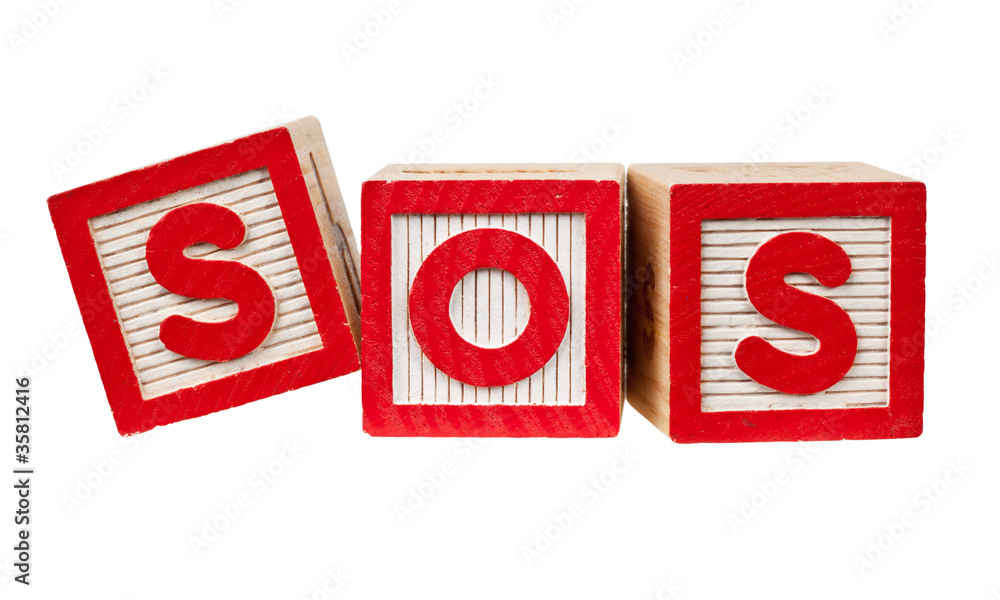 Wooden blocks forming the letters SOS isolated Wooden blocks forming the letters SOS isolated
