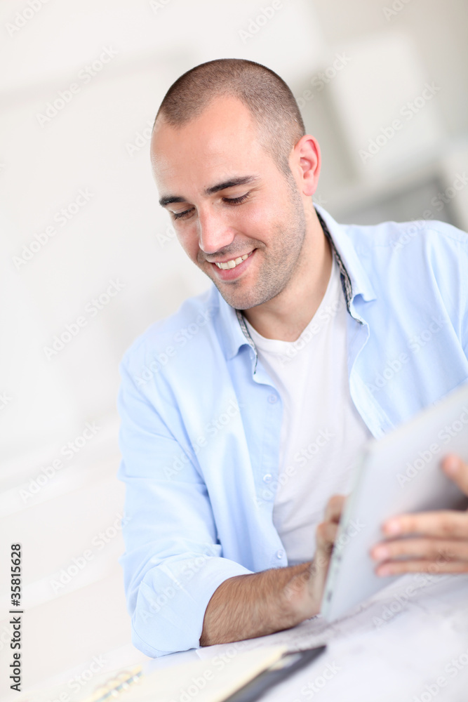 Office worker using electronic tablet Office worker using electronic tablet