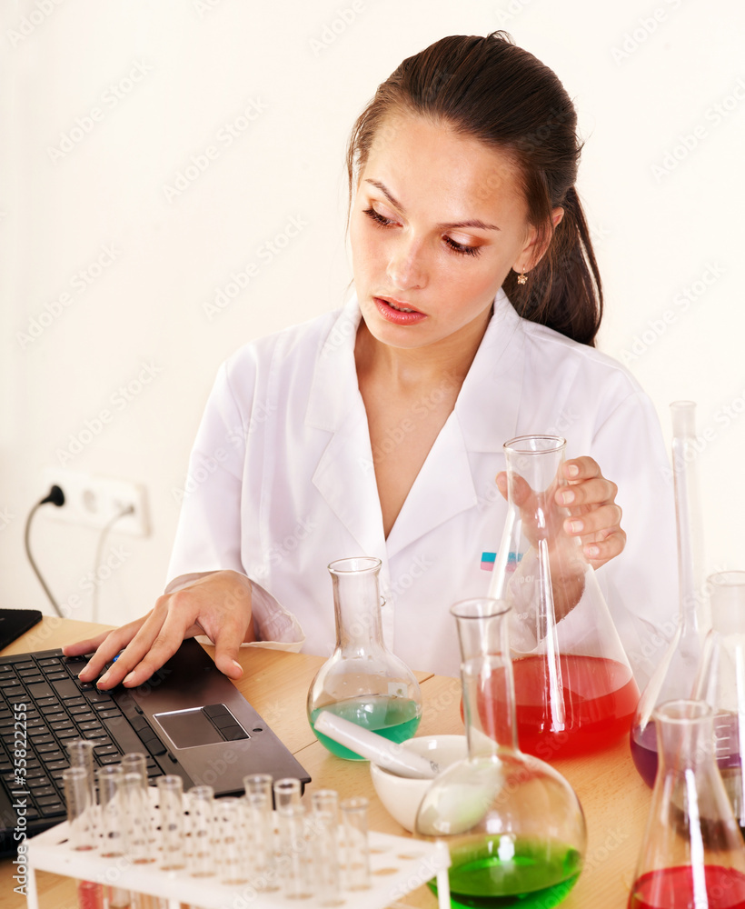 Chemistry student with flask. Chemistry student with flask.