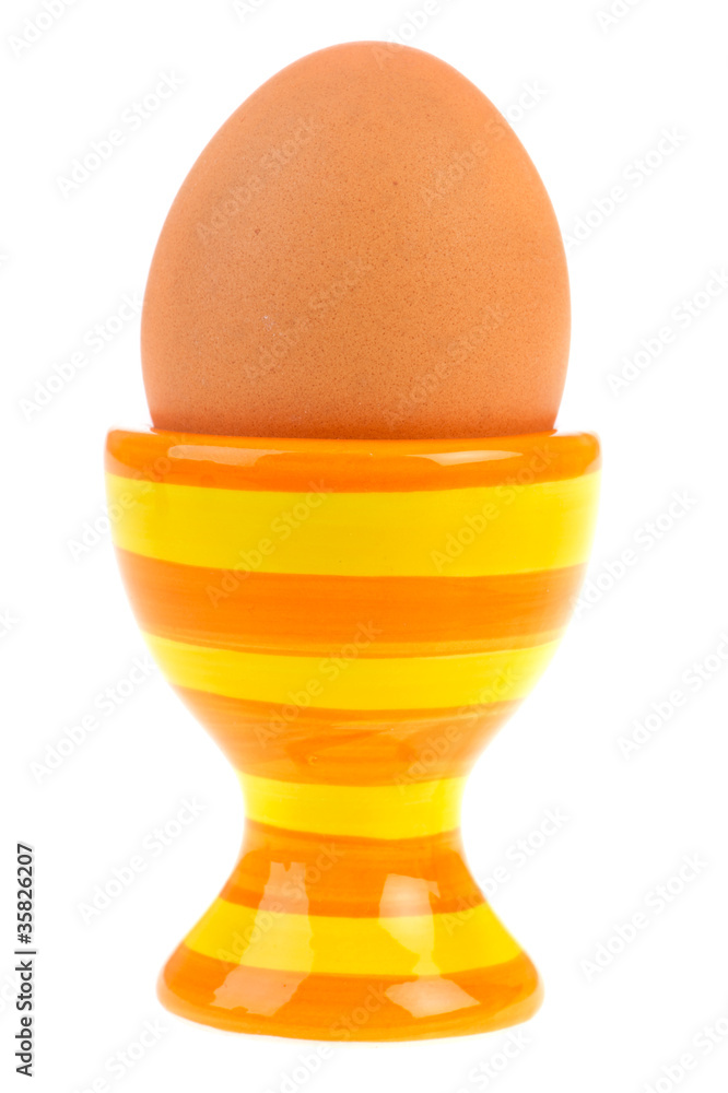 brown egg in egg-cup