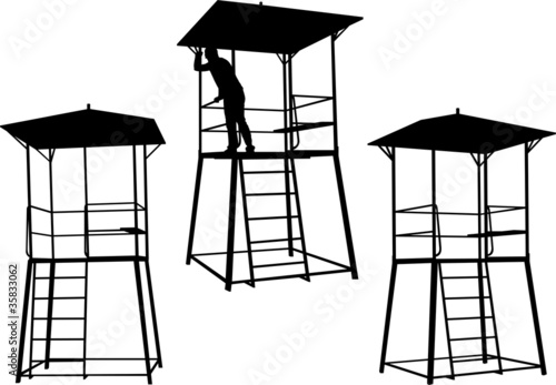 silhouettes of watchtowers