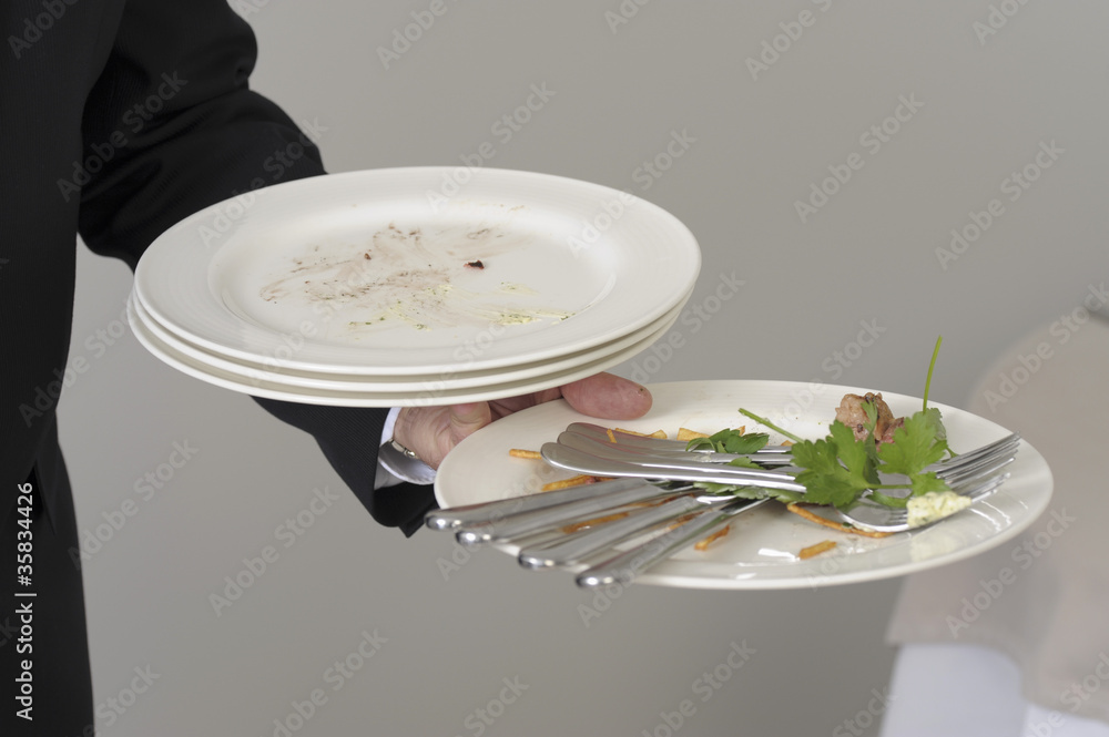 Débarrasser une table Photos Adobe Stock