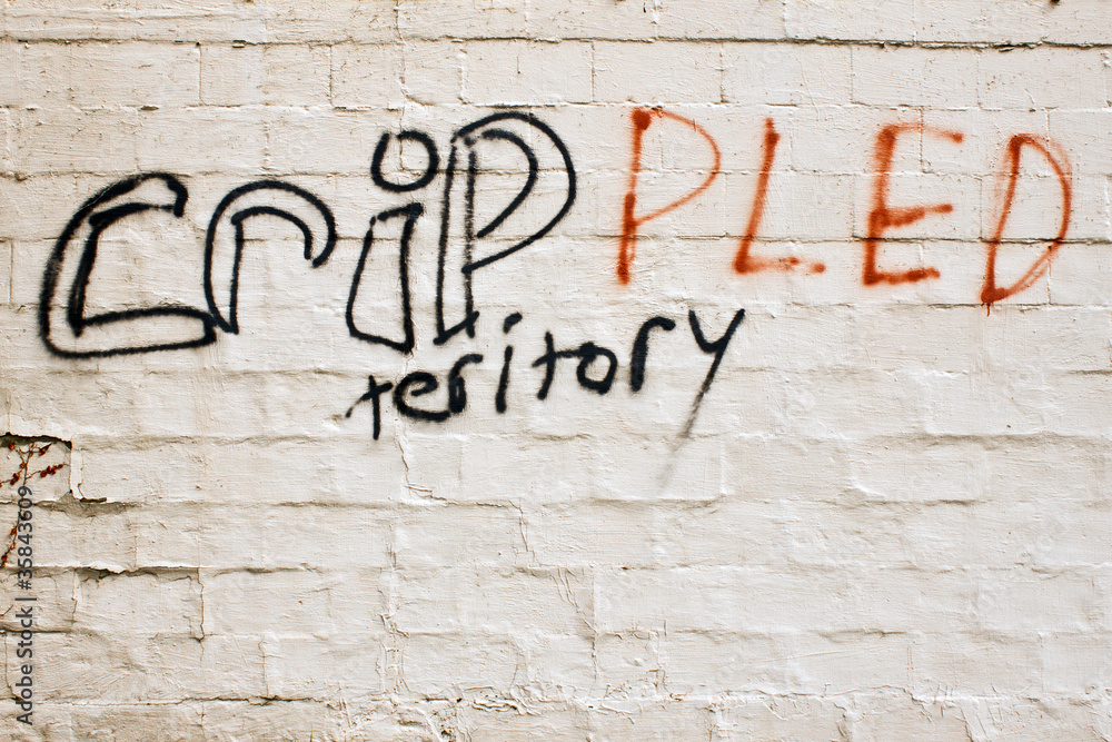 Misspelled gang graffiti in a bad neighborhood Misspelled gang graffiti in a bad neighborhood