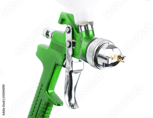 Spray gun isolated over white background photo