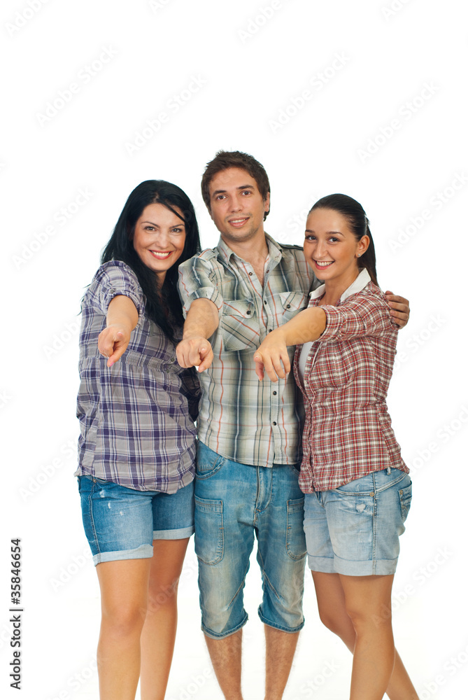 Cheerful young group of people pointing to you Cheerful young group of people pointing to you