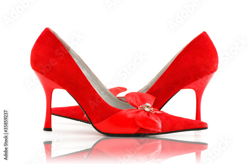 Elegant red shoes on the white