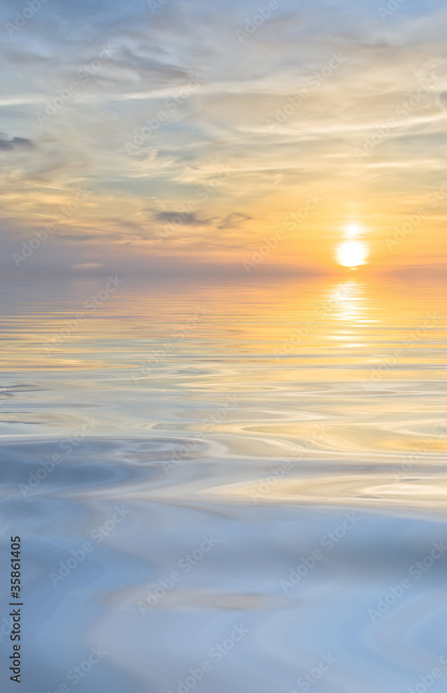 bright sunset and clouds at sea background