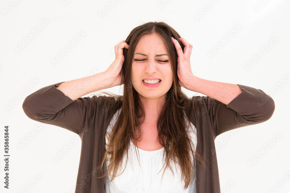 Young panic woman with hands on the head Young panic woman with hands on the head