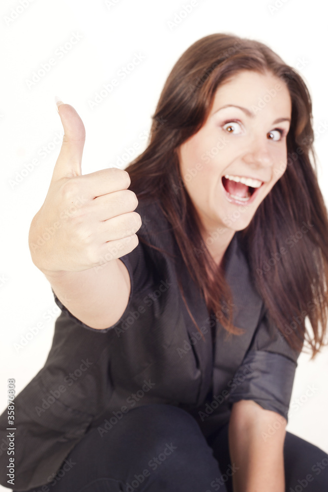 Young smiling businesswoman showing hand ok sign Young smiling businesswoman showing hand ok sign