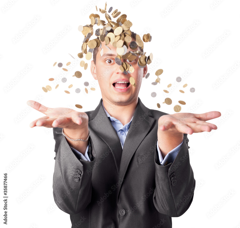 young businessman throws up many coins isolated on white backgro young businessman throws up many coins isolated on white backgro