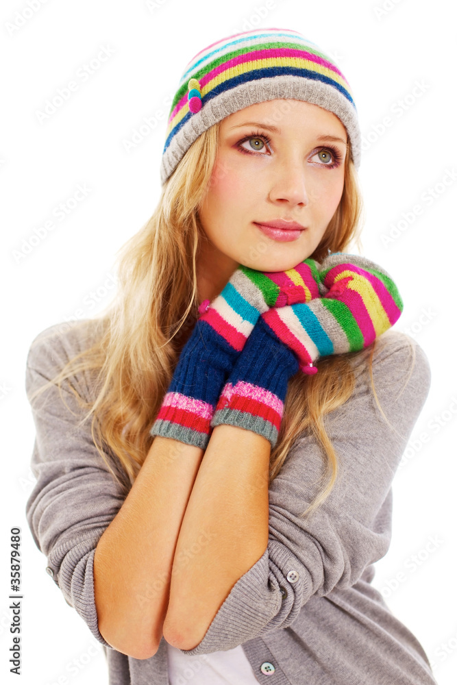 Pretty girl in colorful cap and mittens Pretty girl in colorful cap and mittens
