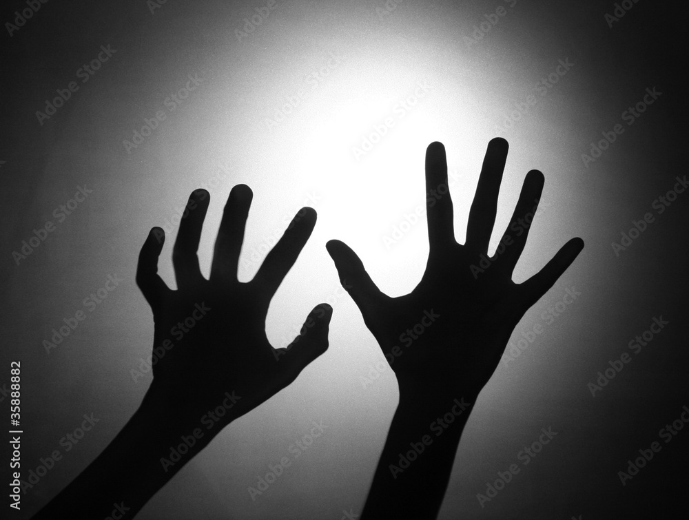Silhouette of two hands
