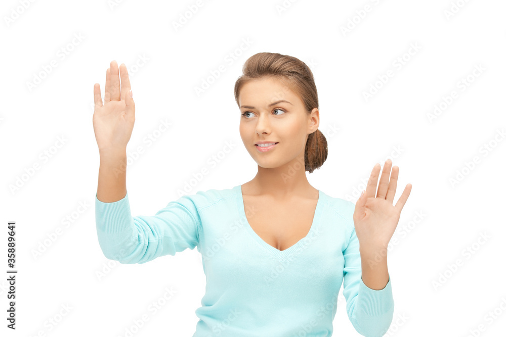 Fototapeta premium businesswoman working with something imaginary