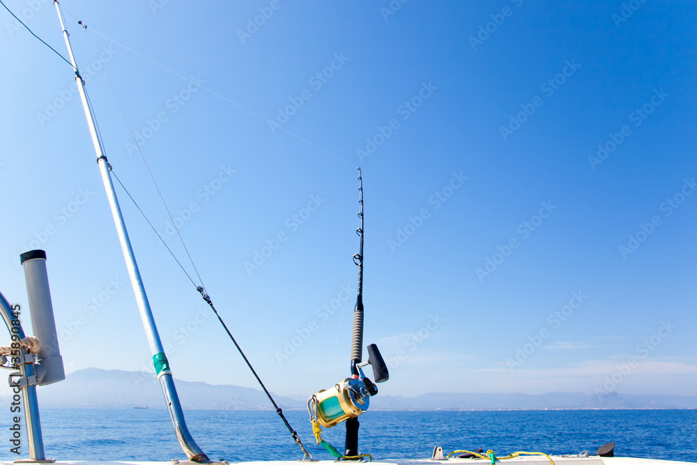 Fototapeta premium fishing boat trolling with outrigger gear