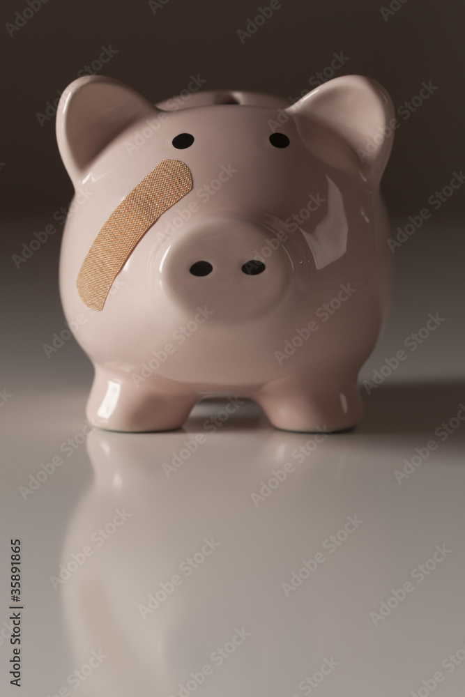 Piggy Bank with Bandage on Face Piggy Bank with Bandage on Face