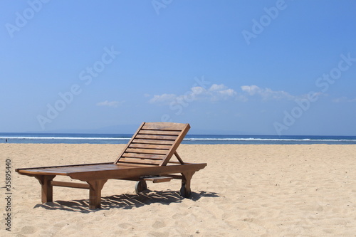 Wooden chair on the beach