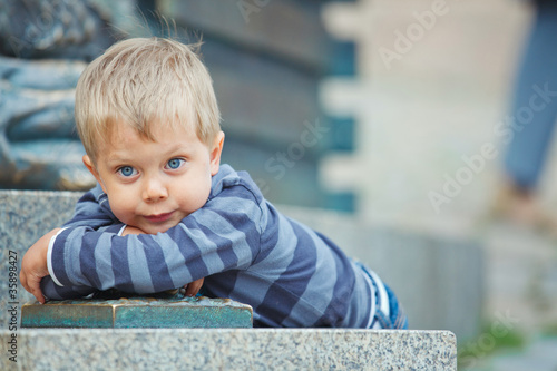 Smiling three year old boy clouse-up portrait photo