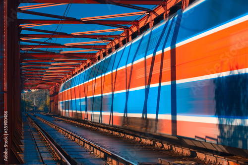 Abstract composition of moving train on the old railway bridge