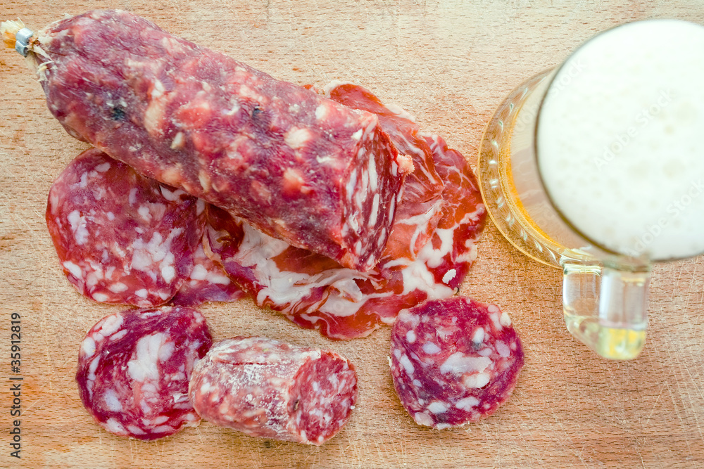 italian salami and glass of beer italian salami and glass of beer