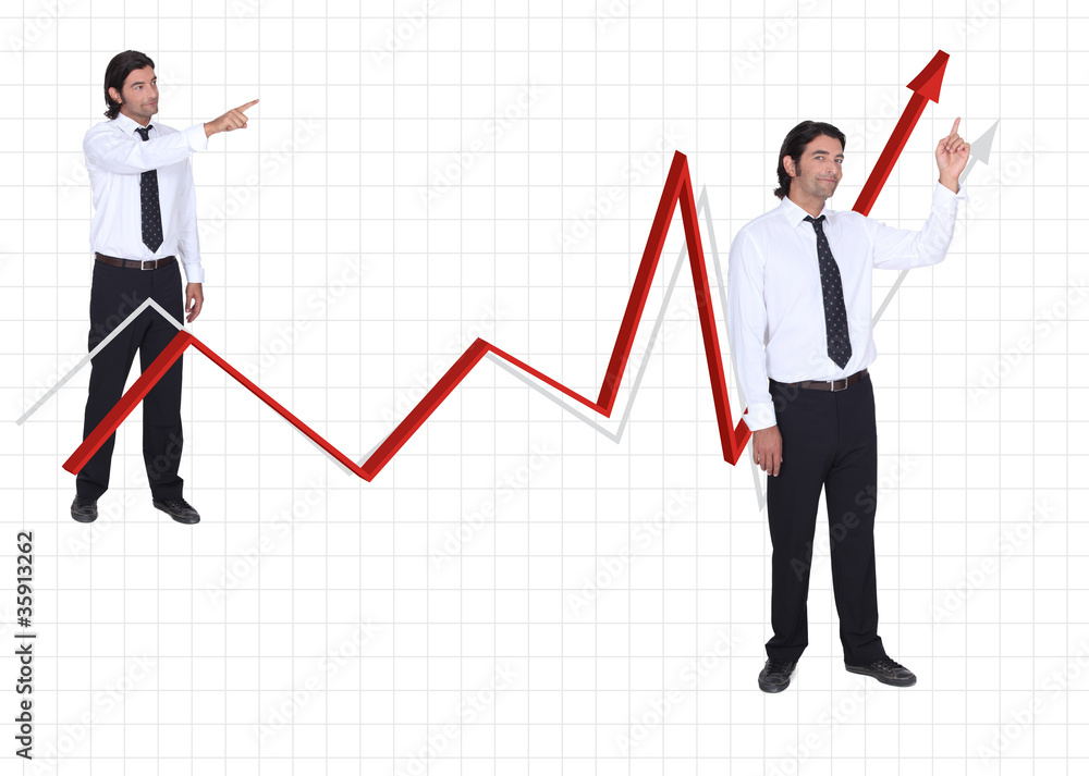 Businessman on a growth chart Businessman on a growth chart