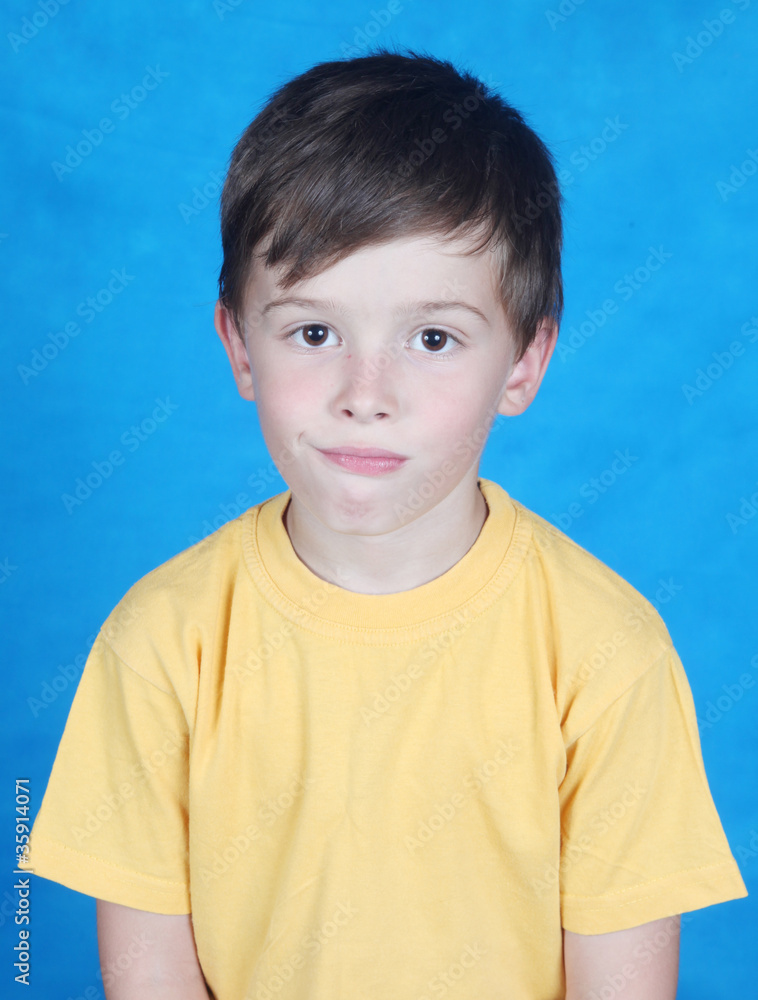Emotions of the boy on a dark blue background Emotions of the boy on a dark blue background