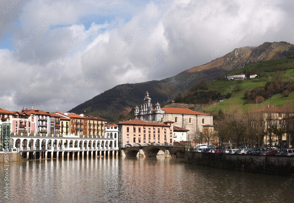 View of Tolosa, Oria river, town market and Santa Maria Church