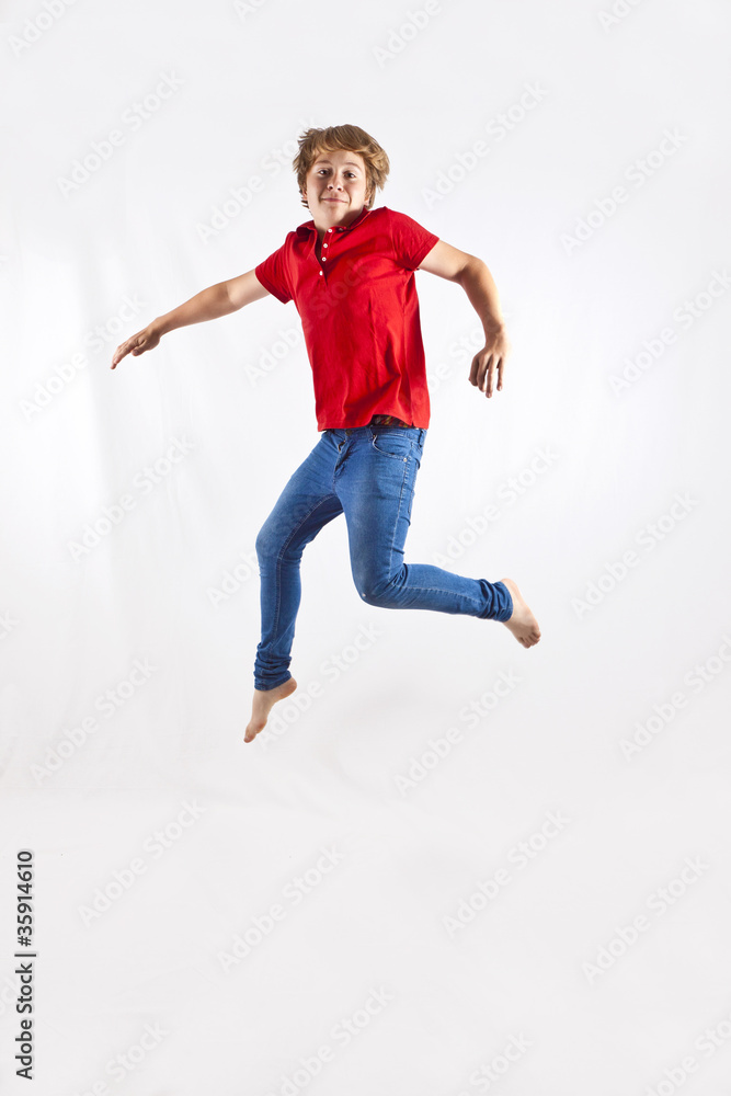 cute boy jumping in the air cute boy jumping in the air