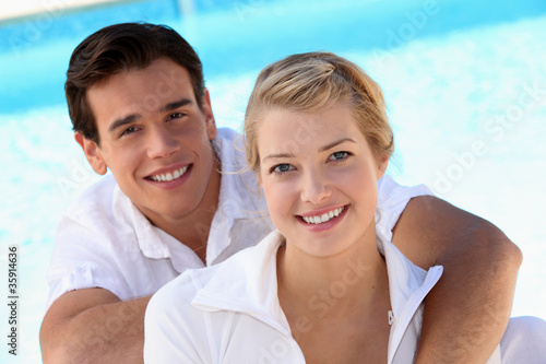 Grinning young couple