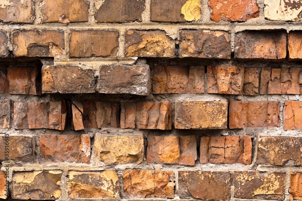 Brick wall texture with a lot of cracks Brick wall texture with a lot of cracks
