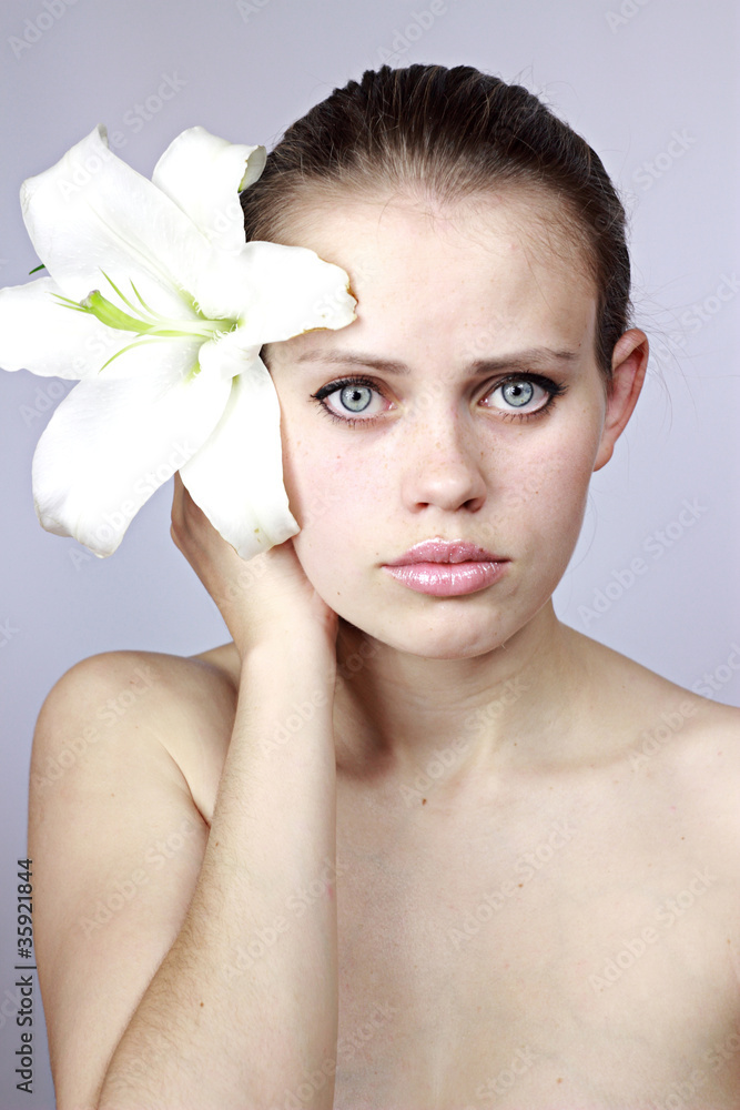 Fototapeta premium woman holding a flower..