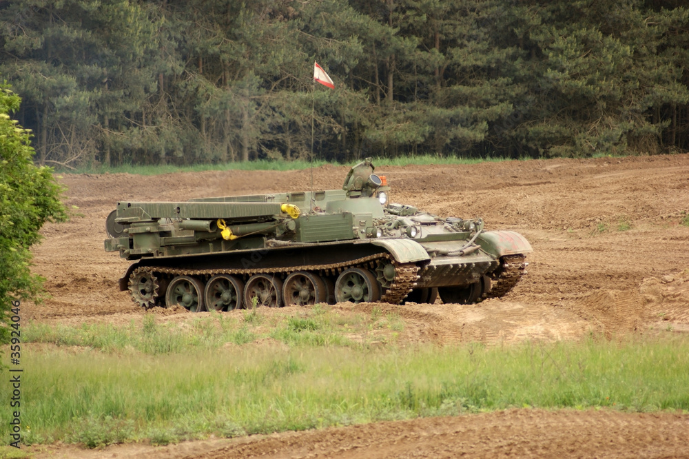 Fototapeta premium offroad scenery with driving tank