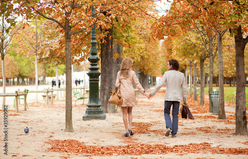 Romantic couple in Paris, having a date at fall photo