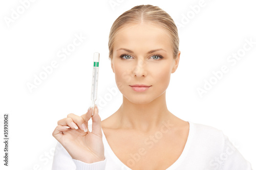 attractive female doctor with thermometer
