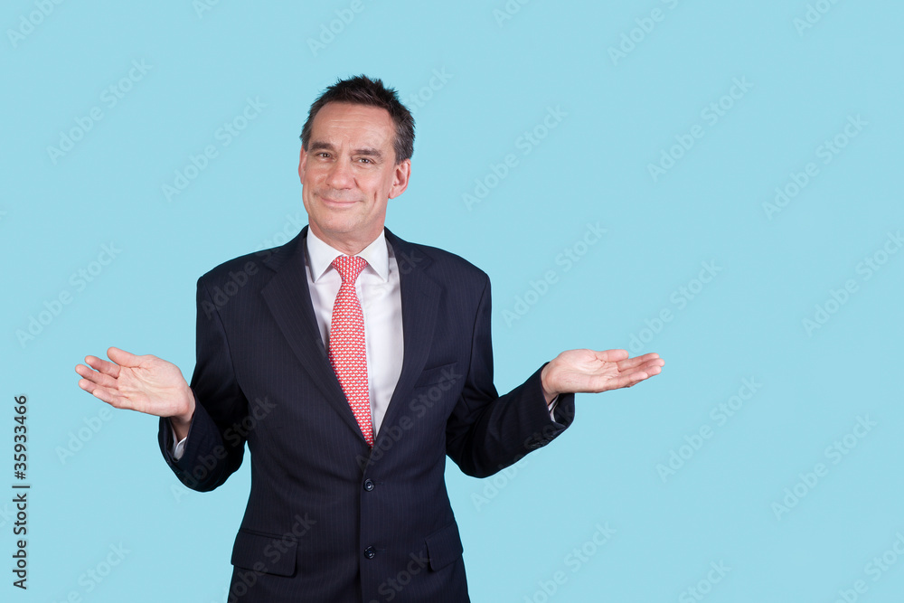 Handsome Smiling Business Man in Suit on Aqua Background Handsome Smiling Business Man in Suit on Aqua Background