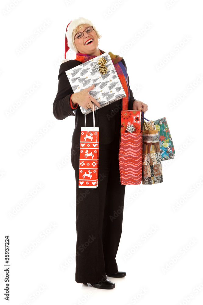 Middle aged santa woman, many gifts
