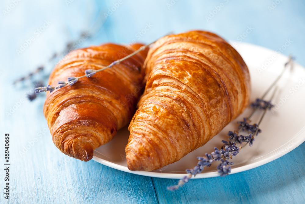 Two croissants with dry lavender