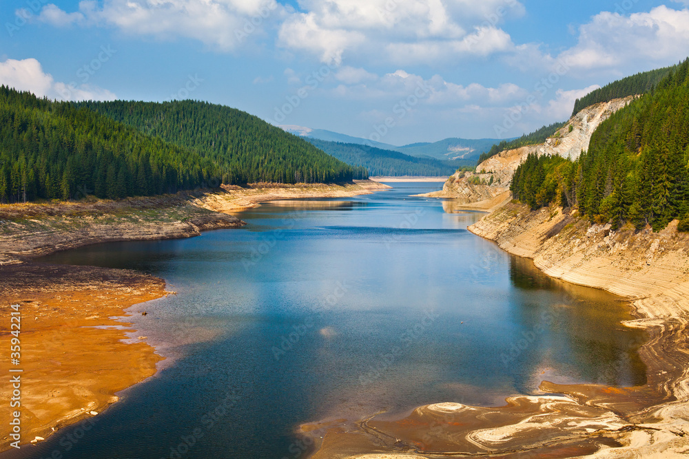 Dam lake Oasa in Romanian mountains Dam lake Oasa in Romanian mountains