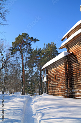 snow lane near rural building © Sergey YAkovlev