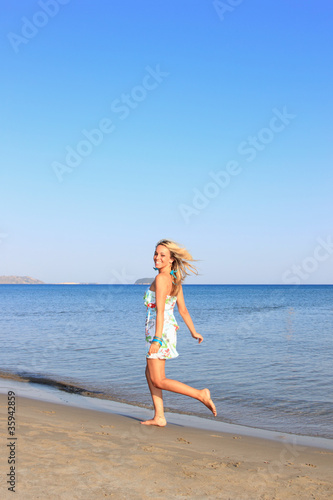 Attractive girl on the beach © Netfalls