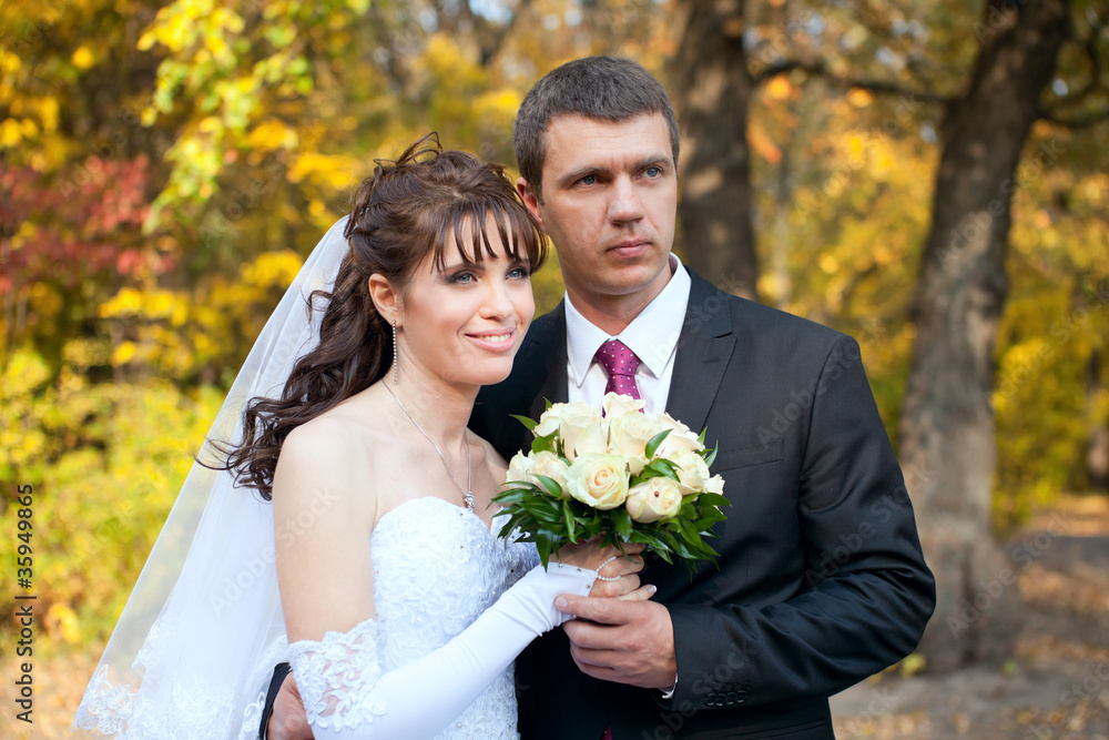 Bride and Groom together in a park Bride and Groom together in a park