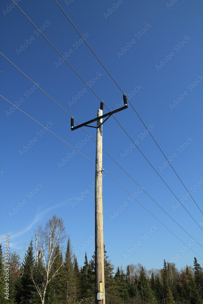 electrical post over blue sky