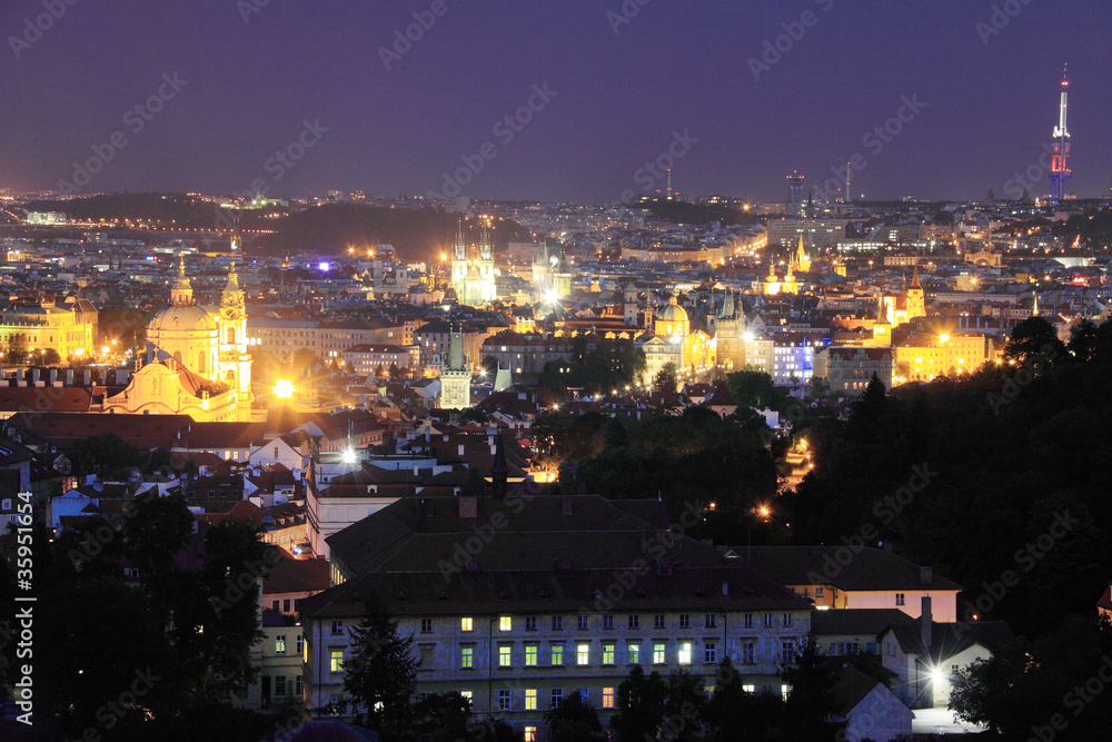 The night View on bright Prague with St. Nicholas' Cathedral