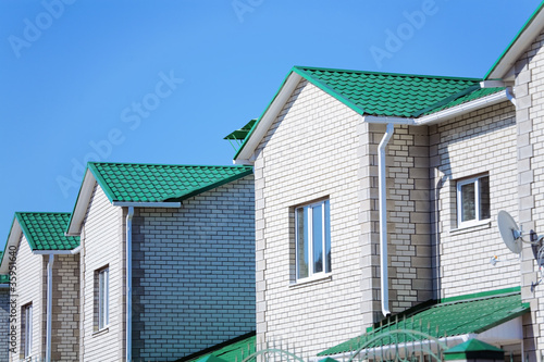Facades of modern brick tow...