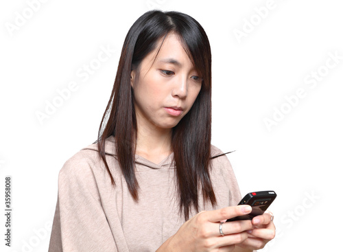 girl reads sms on phone